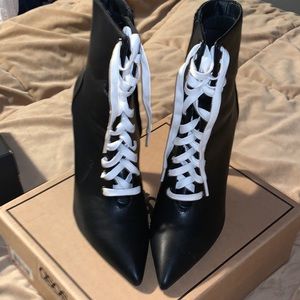 Black pointy toe tied up boots